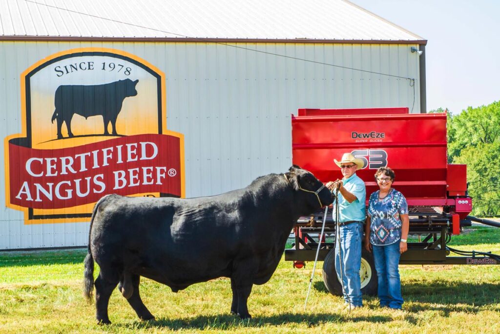 Chris and Sharee Sankey with their National Angus Bull